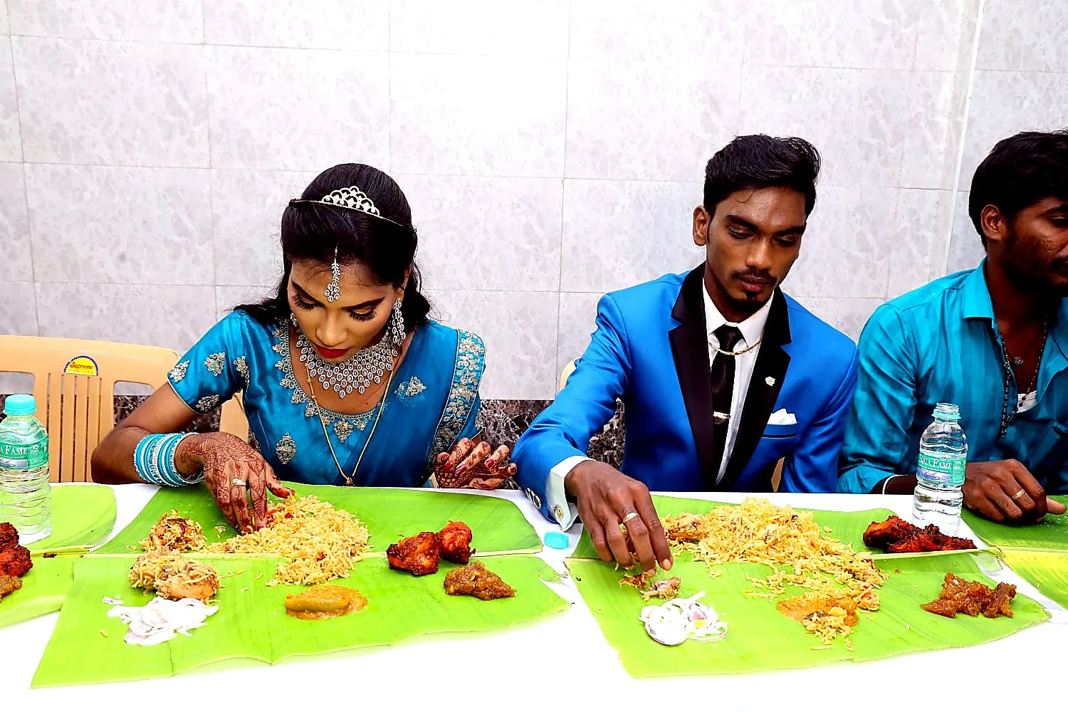 Wedding guests seated for a banana-leaf feast catered in Chennai